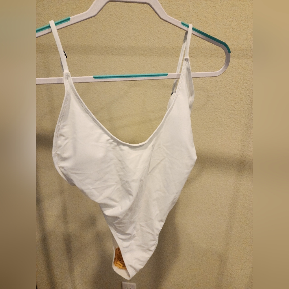 One piece White high cut bathing suit. Size XL.